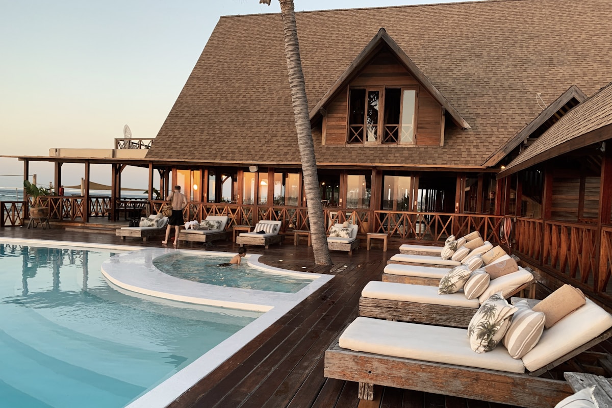 Tropical hotel resort with a pool and oceanfront deck